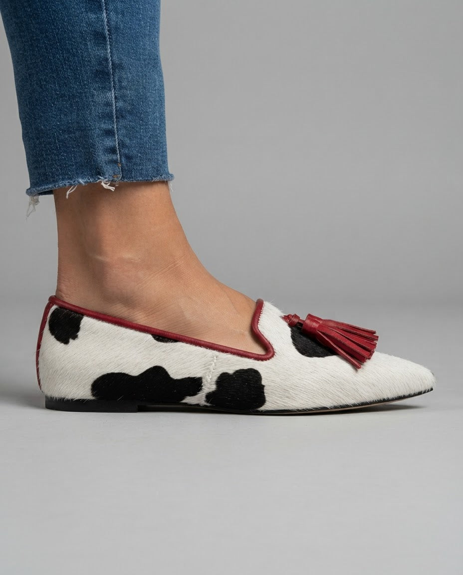 Ginevra | Moccasin, Black and White Cow Print, Red Tassels