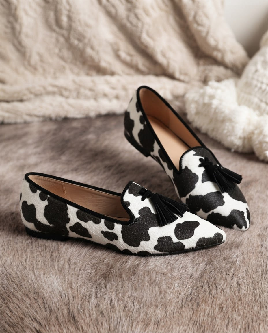 Ginevra | Moccasin, Black and White Cow Print, Black Tassels
